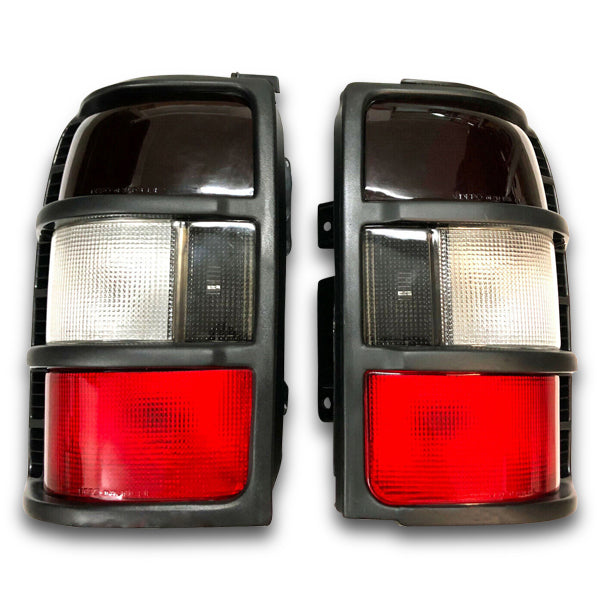 Tail Lights with Black Trim for NH / NJ / NK Mitsubishi Pajero 05/1991-10/1997-Auto Lighting Garage