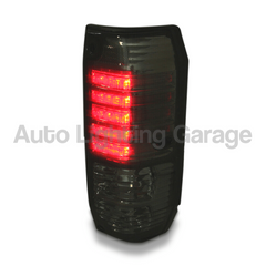 Tail Lights with Smoked Black Lens for 70 / 73 / 78 / 79 Series Toyota Landcruiser 4-Door 1985-2001-Auto Lighting Garage